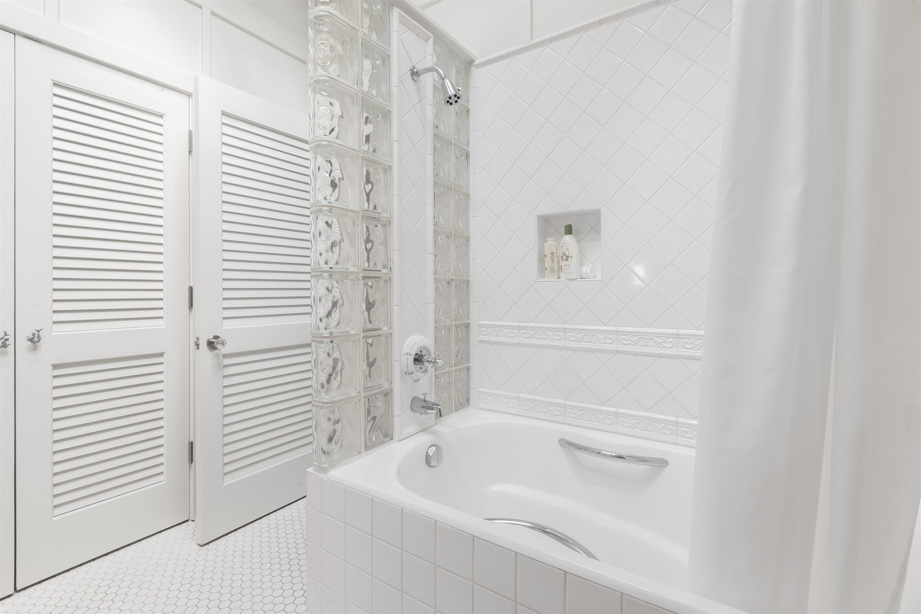 51 Kapohue Road Hana, HI 96713 - Photo 29 of 50 a bathroom with a bathtub and a shower