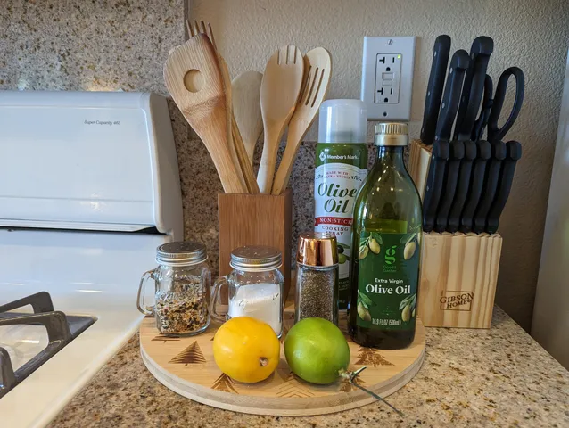 a kitchen with a stove a sink and a refrigerator
