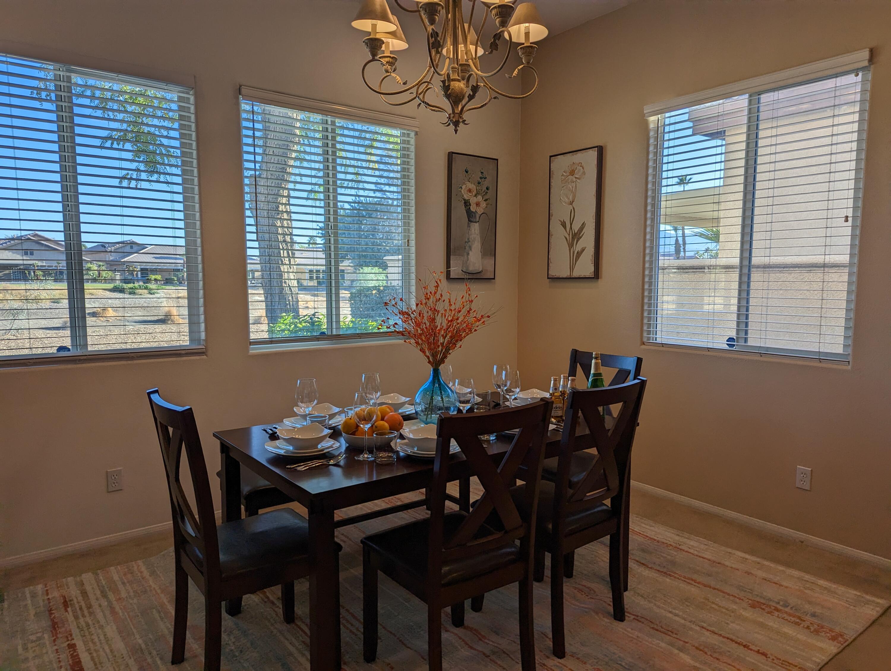 49544 Wayne Street Indio, CA 92201 - Photo 25 of 69 a dining room with furniture and window