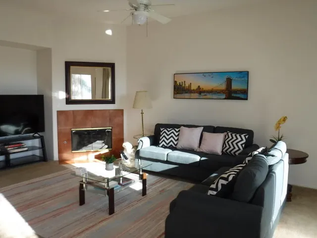 a view of a vase of flowers sitting on a table