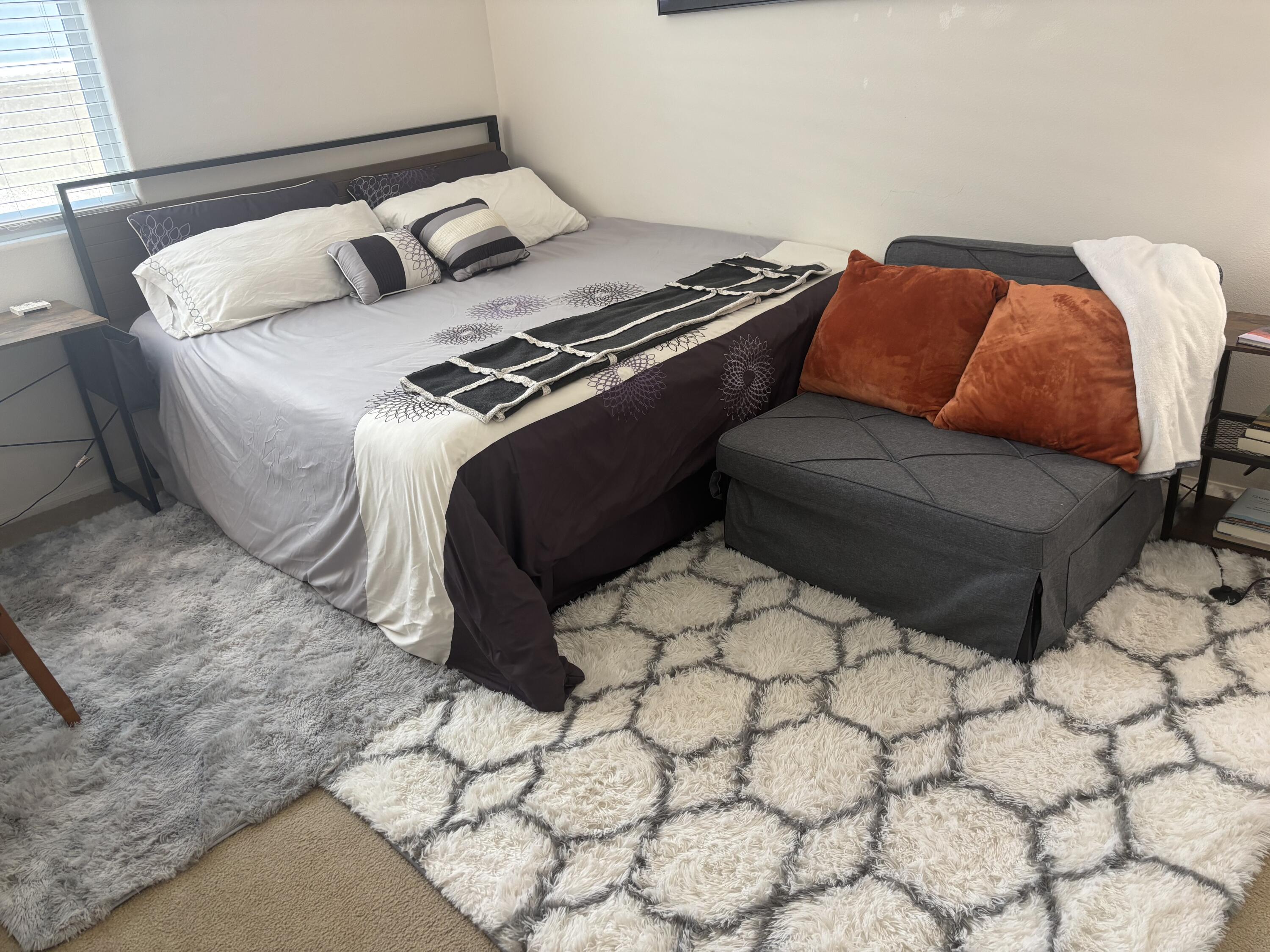 49544 Wayne Street Indio, CA 92201 - Photo 44 of 69 a bedroom with a bed and a window