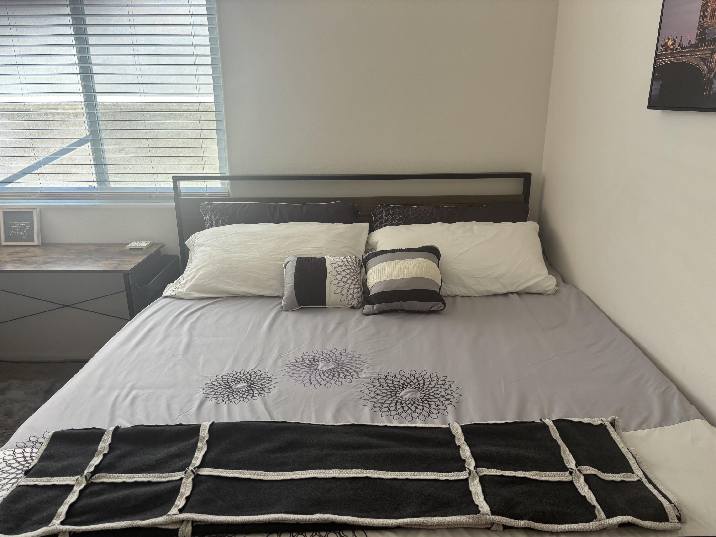 49544 Wayne Street Indio, CA 92201 - Photo 46 of 69 a bedroom with a bed and a window