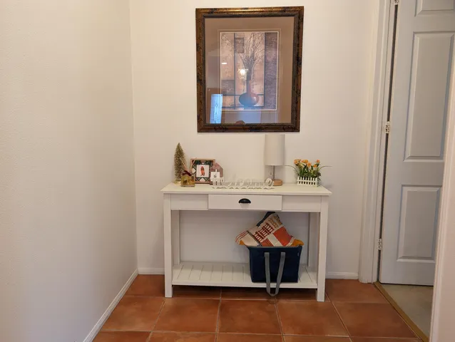 a kitchen with cabinets appliances and a window