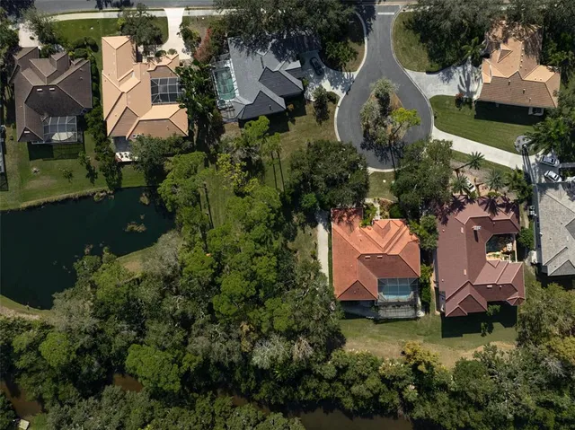 a aerial view of a house with a yard