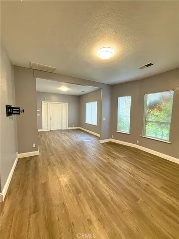 a view of an empty room and window