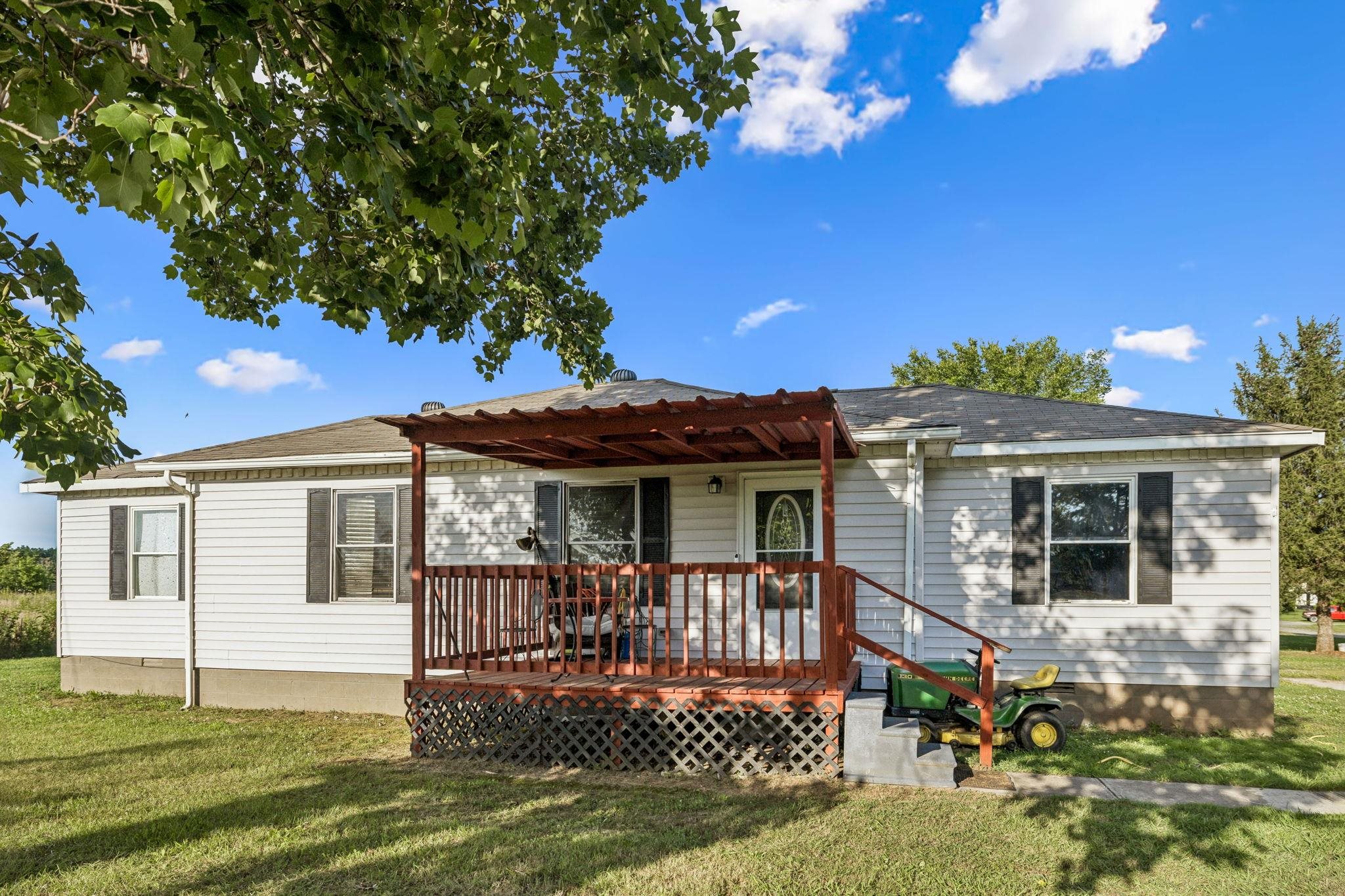 a front view of a house with porch