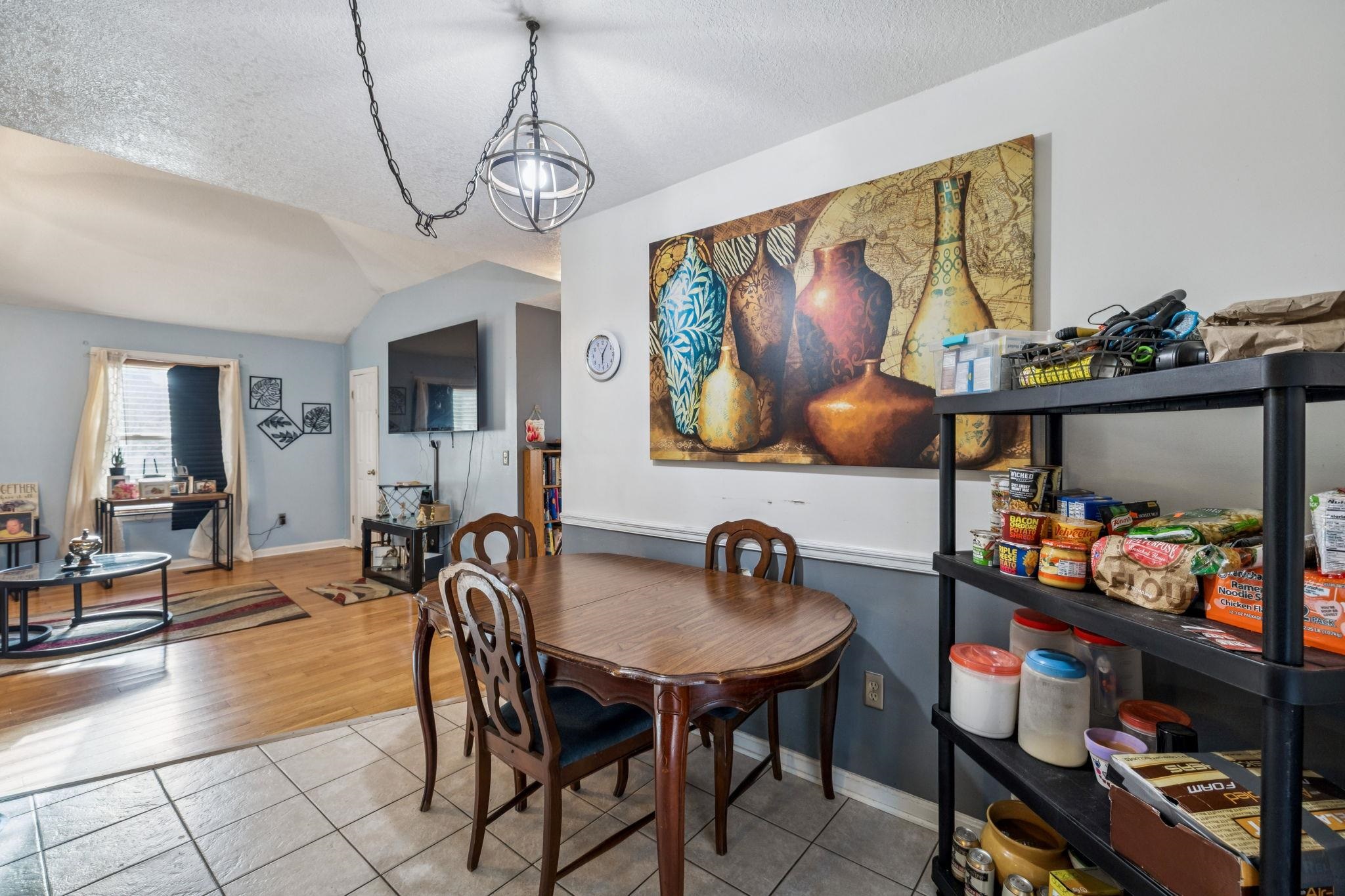 537 Isbell Lane Decherd, TN 37324 - Photo 14 of 40 a view of a dining room with furniture and chandelier