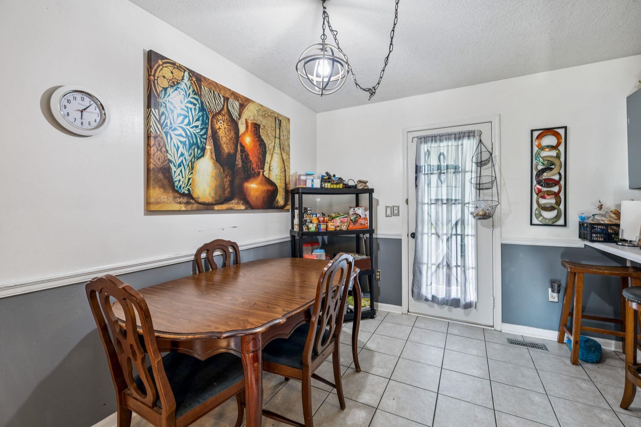 537 Isbell Lane Decherd, TN 37324 - Photo 15 of 40 a dining room with furniture and window