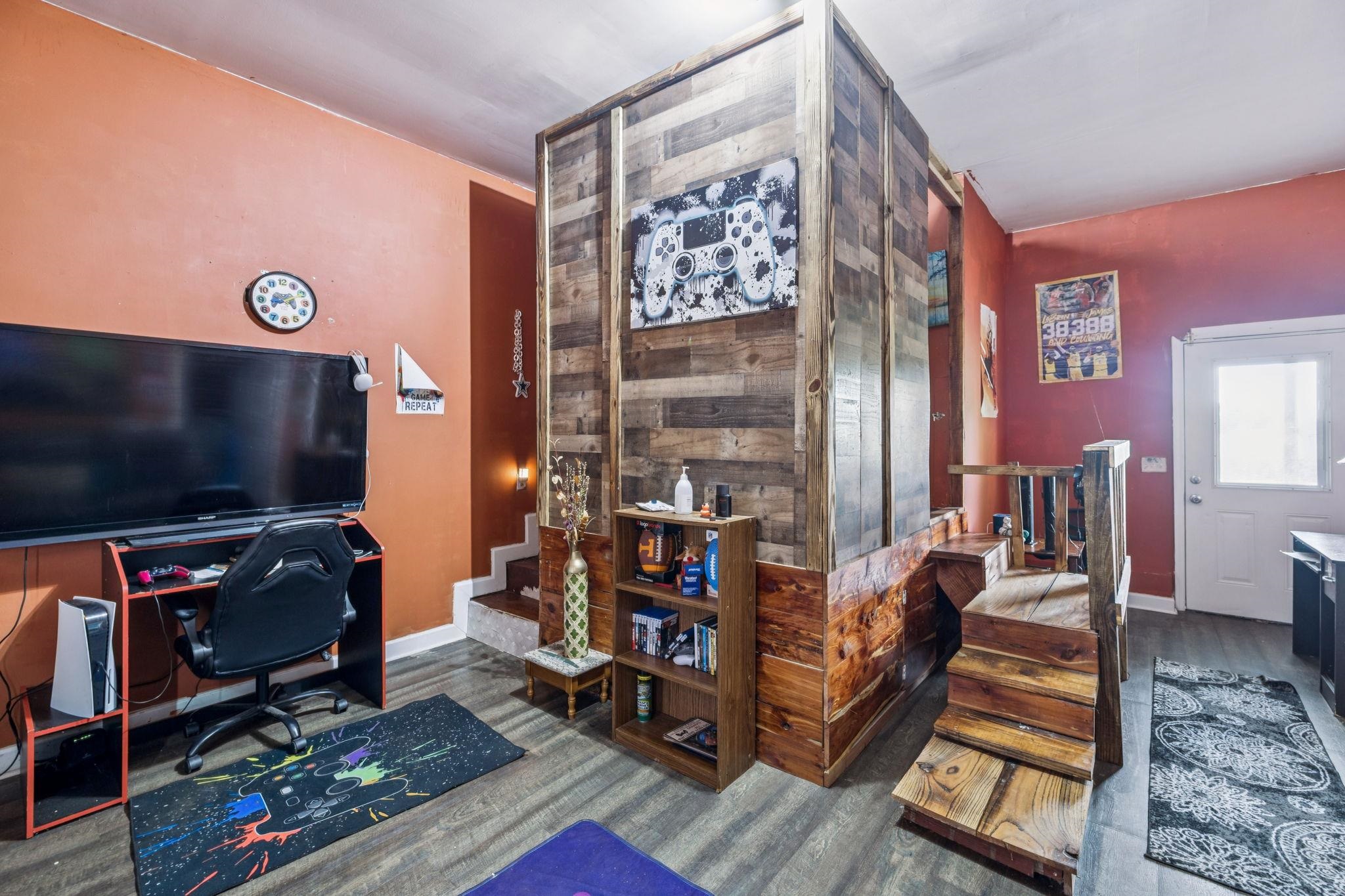 537 Isbell Lane Decherd, TN 37324 - Photo 19 of 40 a living room with furniture and a flat screen tv