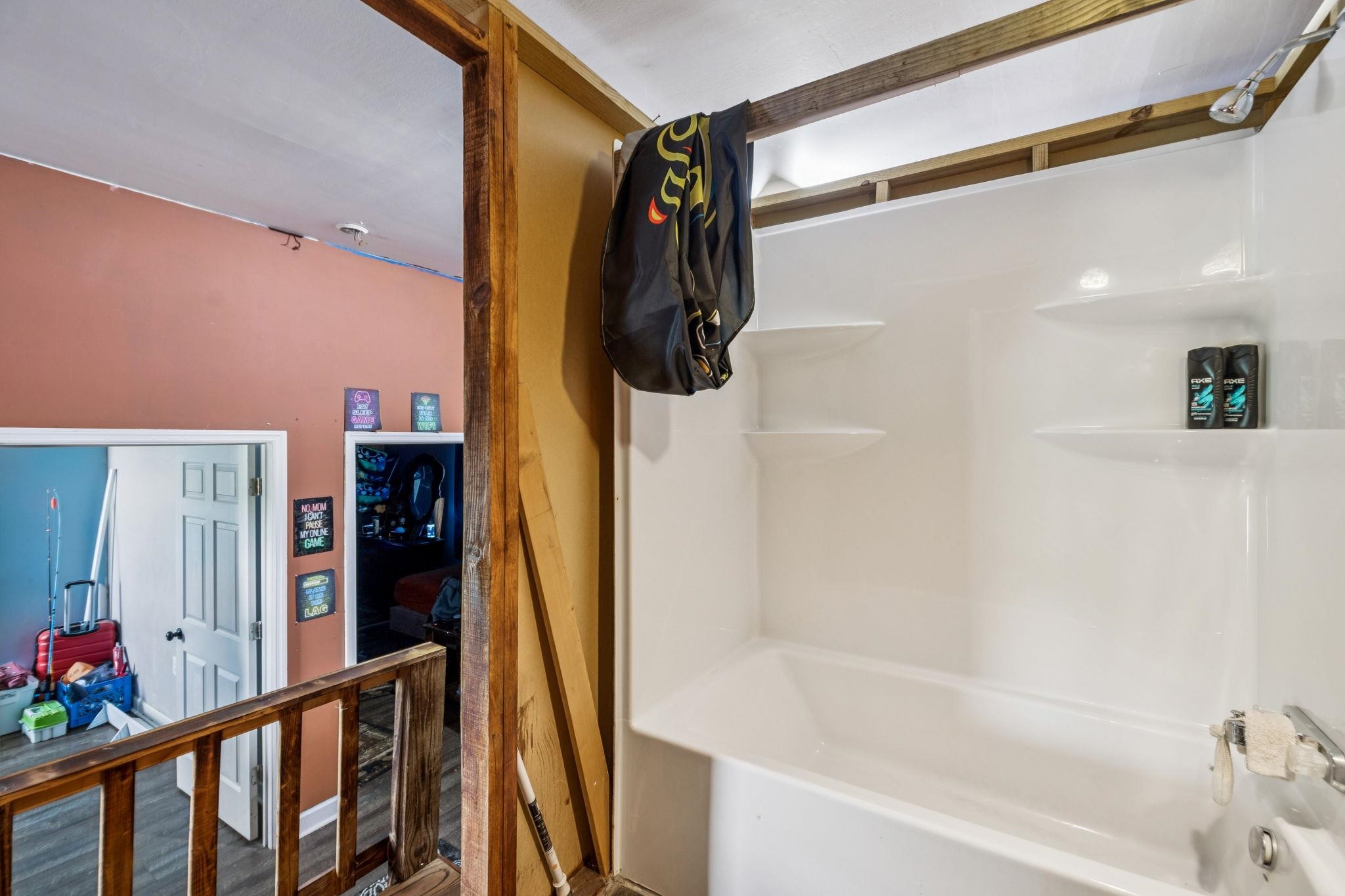 537 Isbell Lane Decherd, TN 37324 - Photo 22 of 40 a bathroom with a shower and a tub