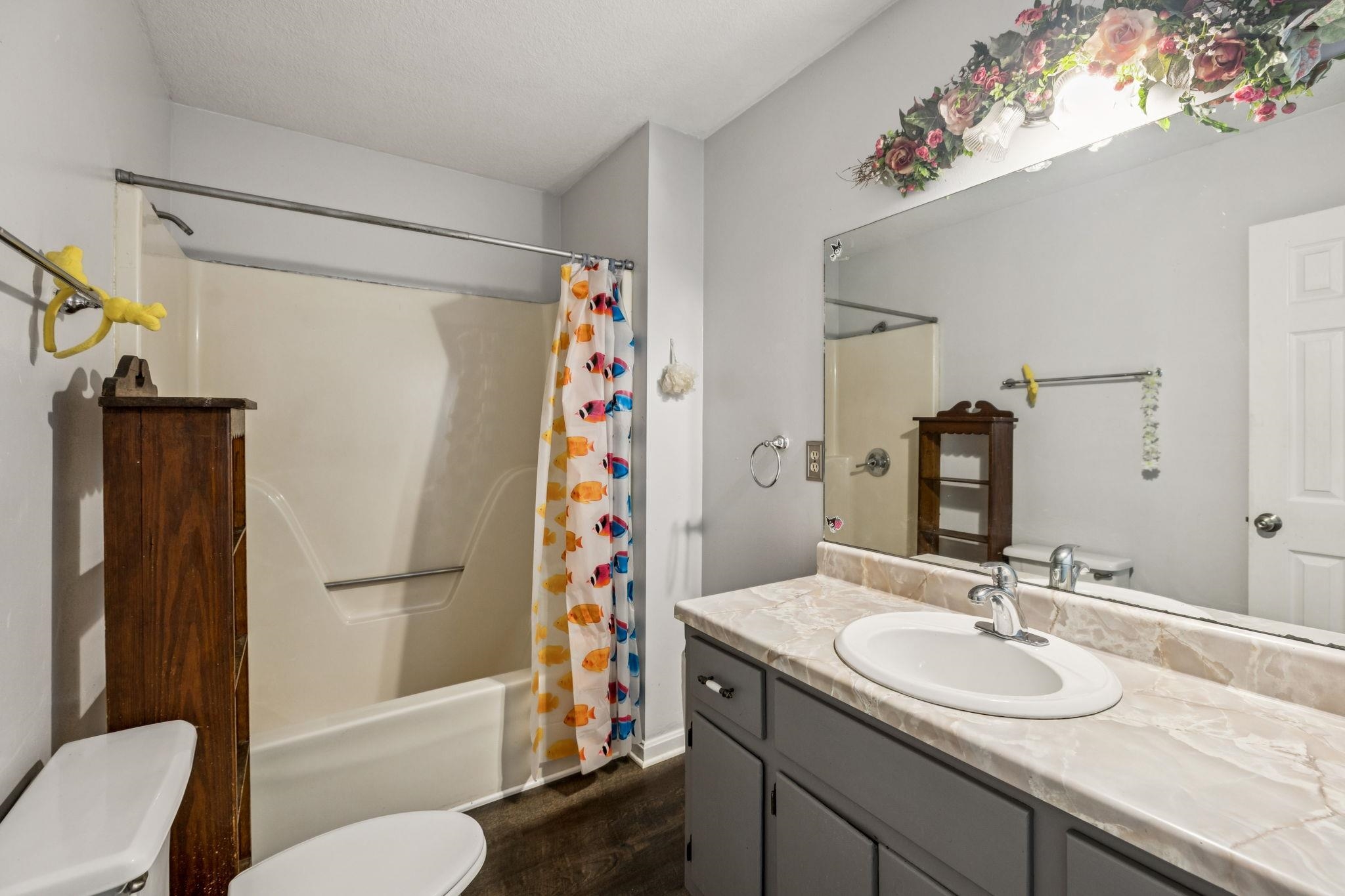 537 Isbell Lane Decherd, TN 37324 - Photo 26 of 40 a bathroom with a sink toilet and shower