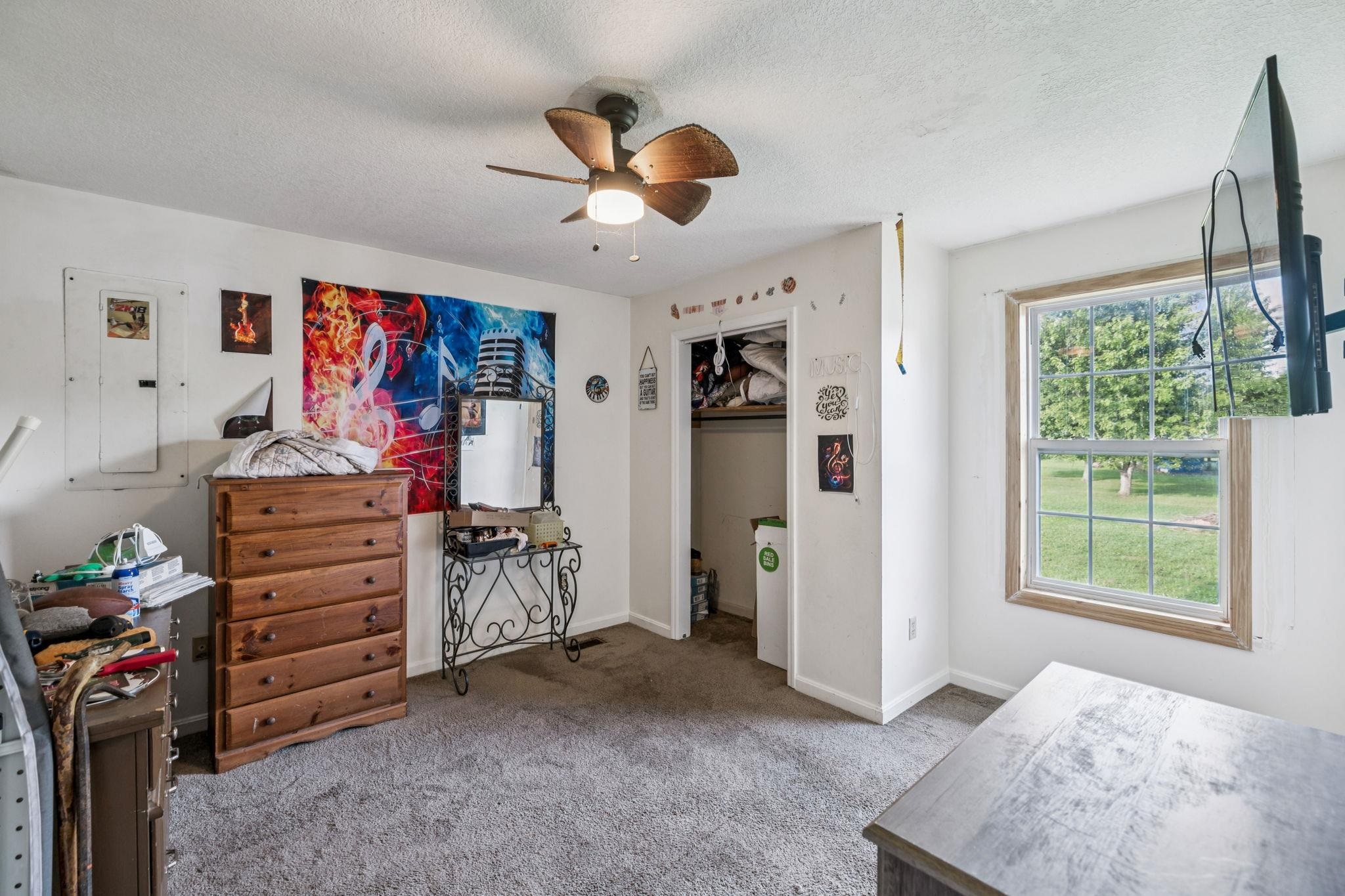 537 Isbell Lane Decherd, TN 37324 - Photo 28 of 40 a view of a workspace with furniture and a window