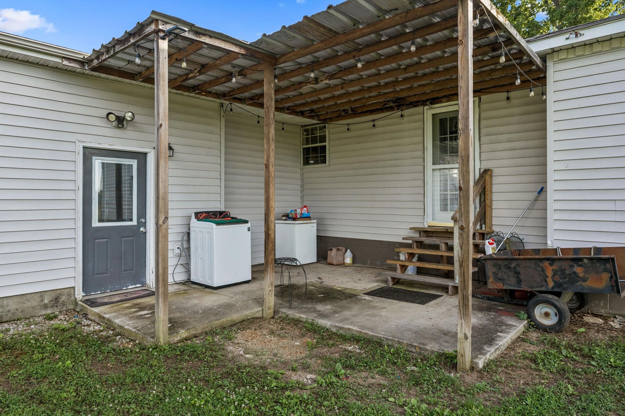 537 Isbell Lane Decherd, TN 37324 - Photo 35 of 40 a view of a house with backyard
