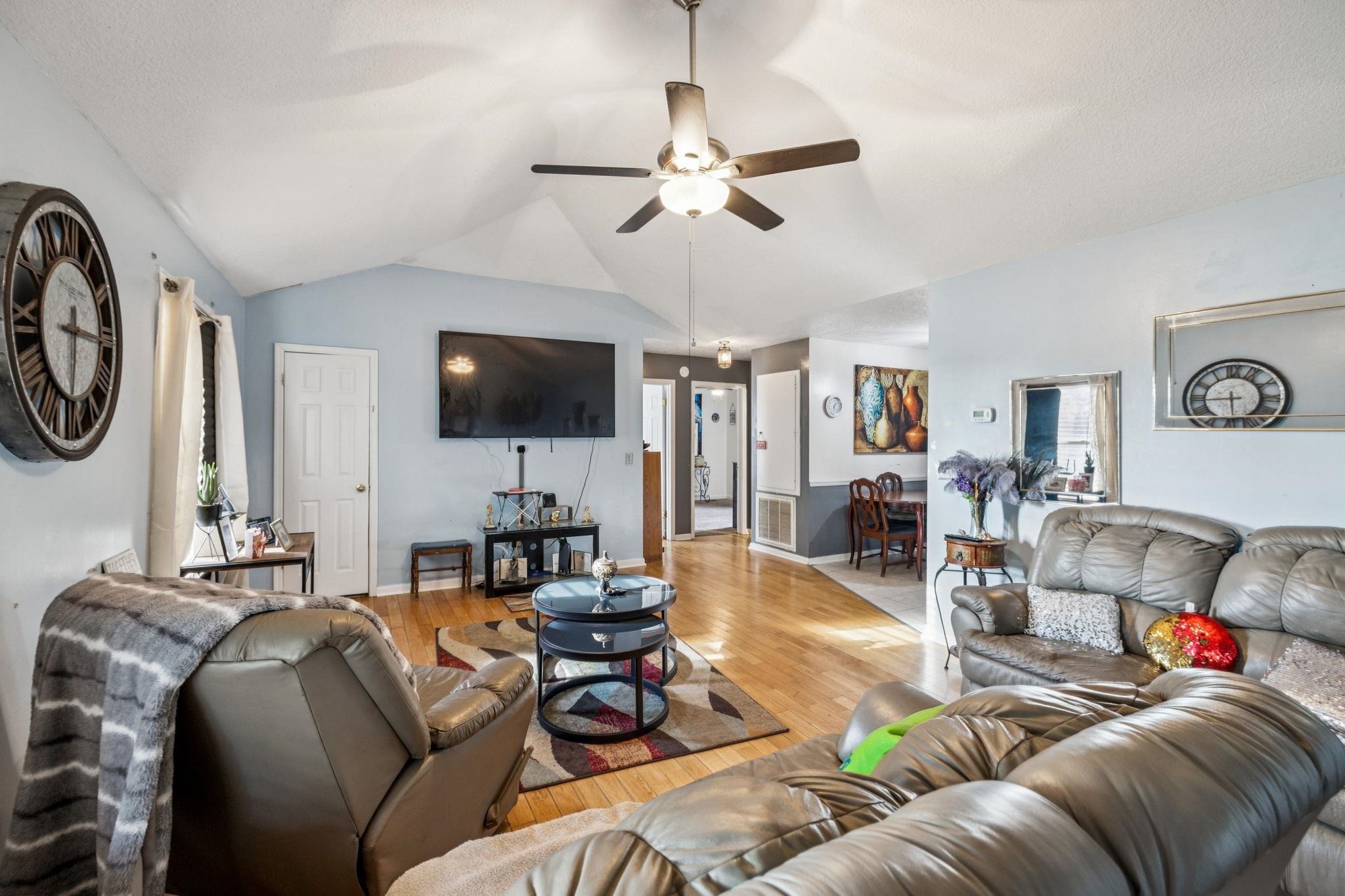 537 Isbell Lane Decherd, TN 37324 - Photo 7 of 40 a living room with furniture and a flat screen tv
