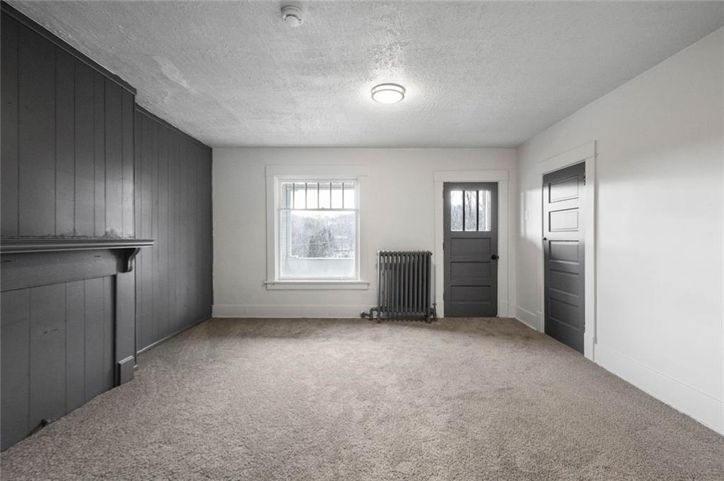 306 Park Road Ambridge, PA 15003 - Photo 11 of 43 an empty room with windows