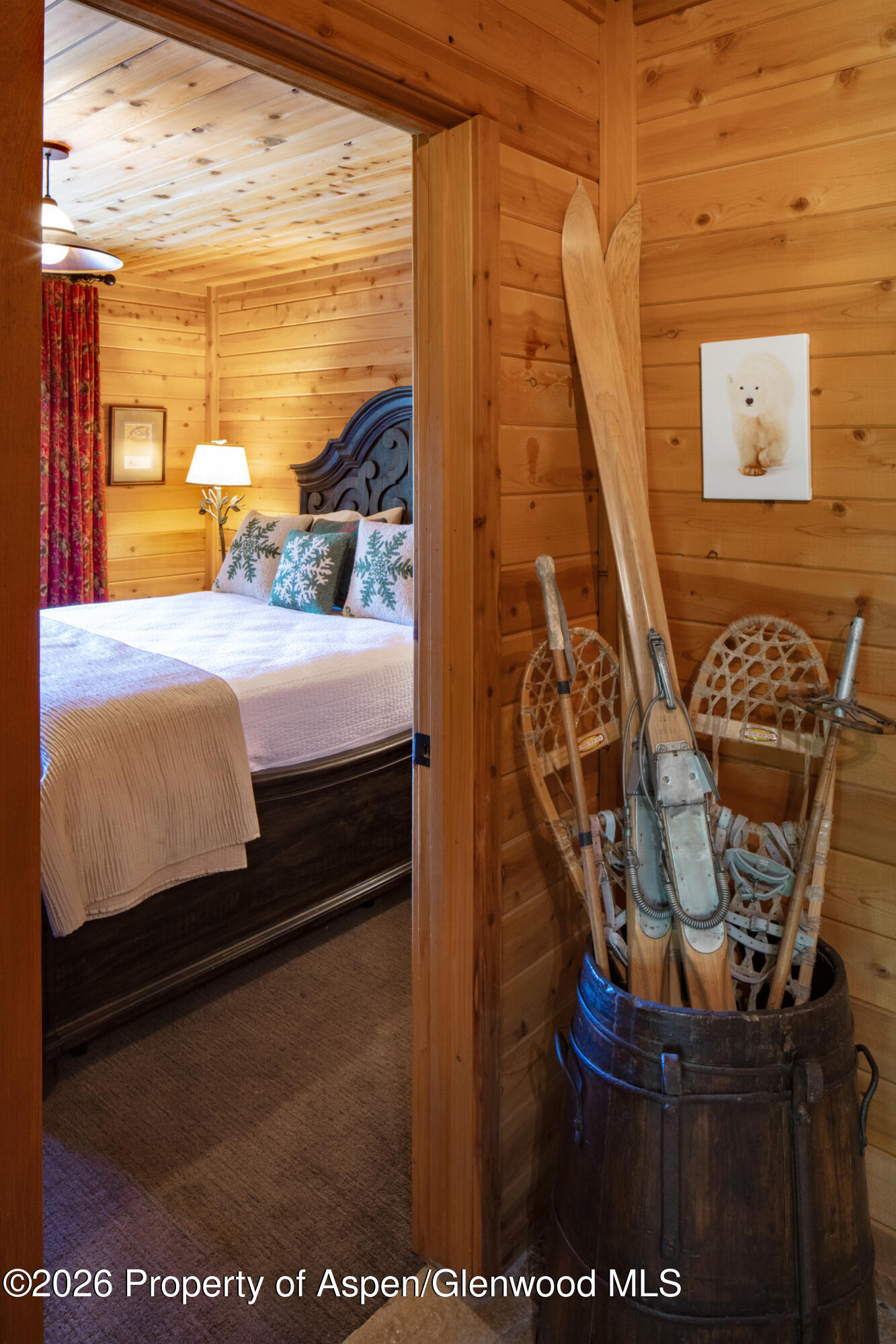294 Ruedi Creek Road Basalt, CO 81621 - Photo 7 of 27 a bedroom with a bed a mirror and couch