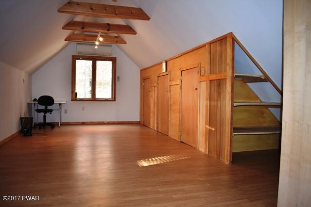 120 Canterbury Road Bushkill, PA 18324 - Photo 24 of 59 a view of a livingroom with wooden floor and a window