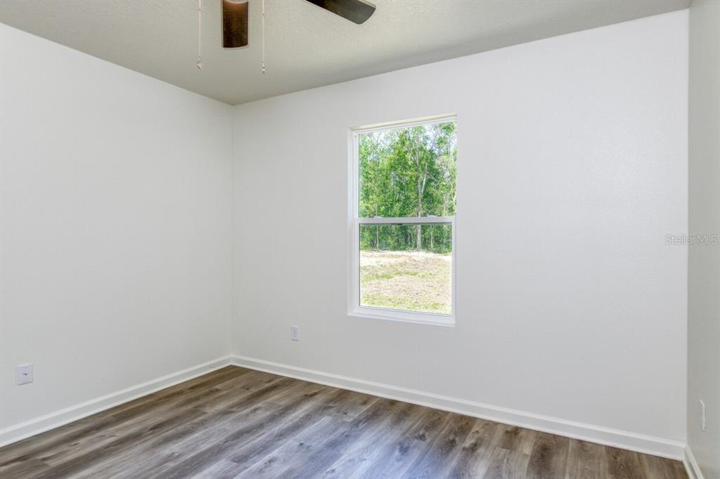 4840 Kenneth Street Hastings, FL 32145 - Photo 11 of 22 an empty room with a window