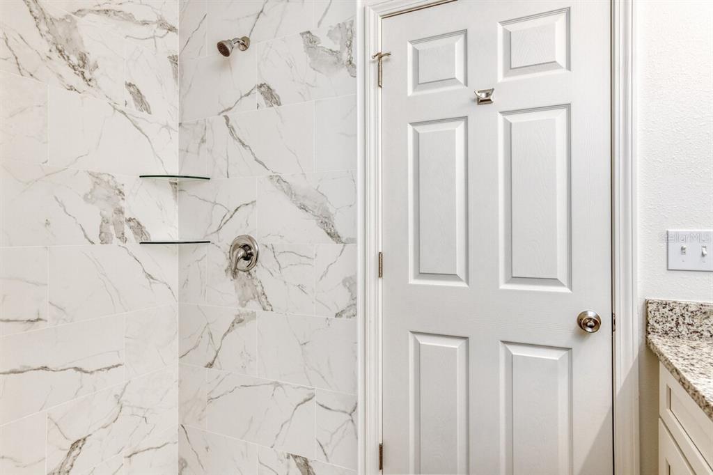 4840 Kenneth Street Hastings, FL 32145 - Photo 8 of 22 a bathroom with a shower