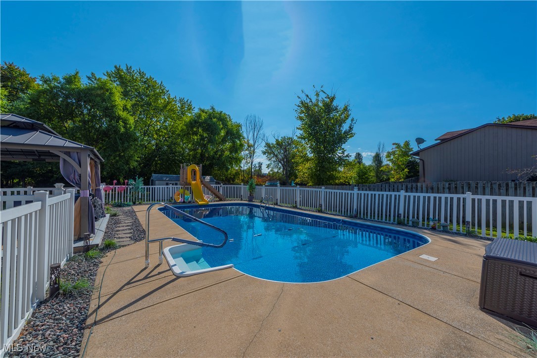 49 North Carpenter Road Brunswick, OH 44212 - Photo 27 of 39 View of pool with a patio area and a gazebo