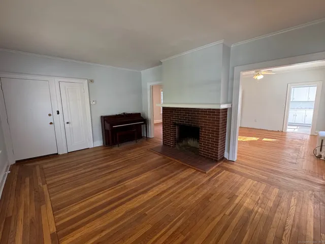 a bedroom with a bed and a fireplace