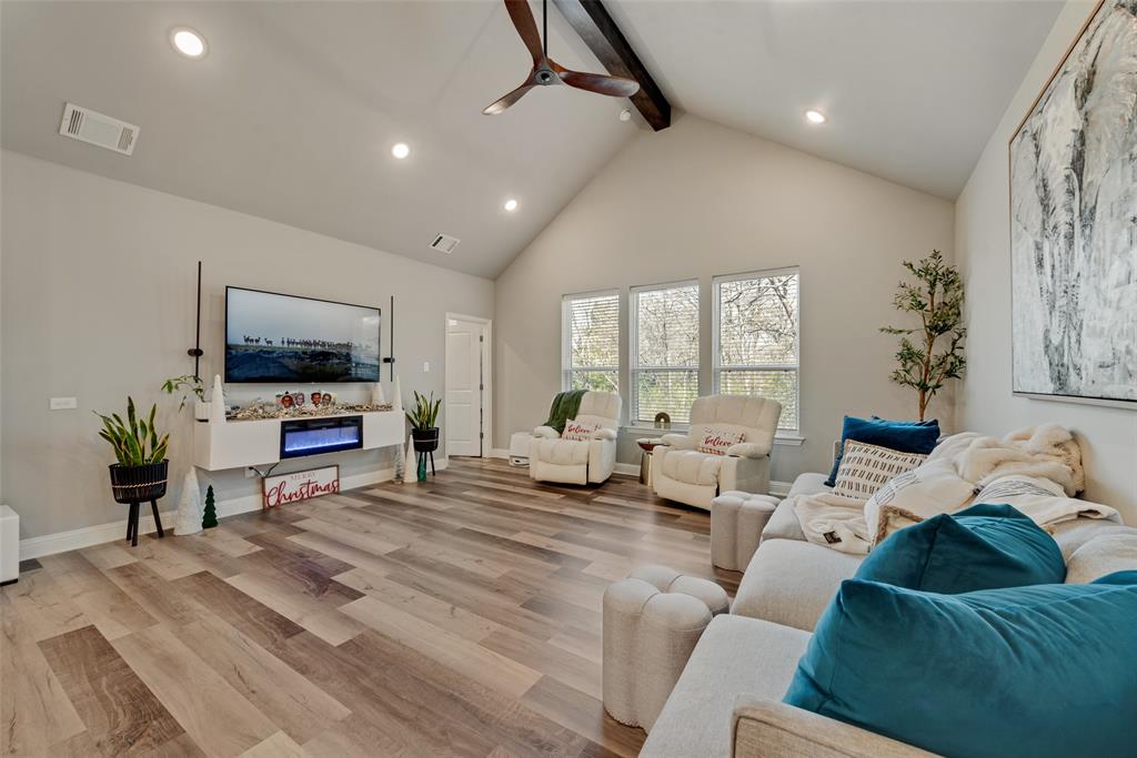 421 Ridgeview Road Sherman, TX 75092 - Photo 11 of 35 a living room with furniture and a flat screen tv