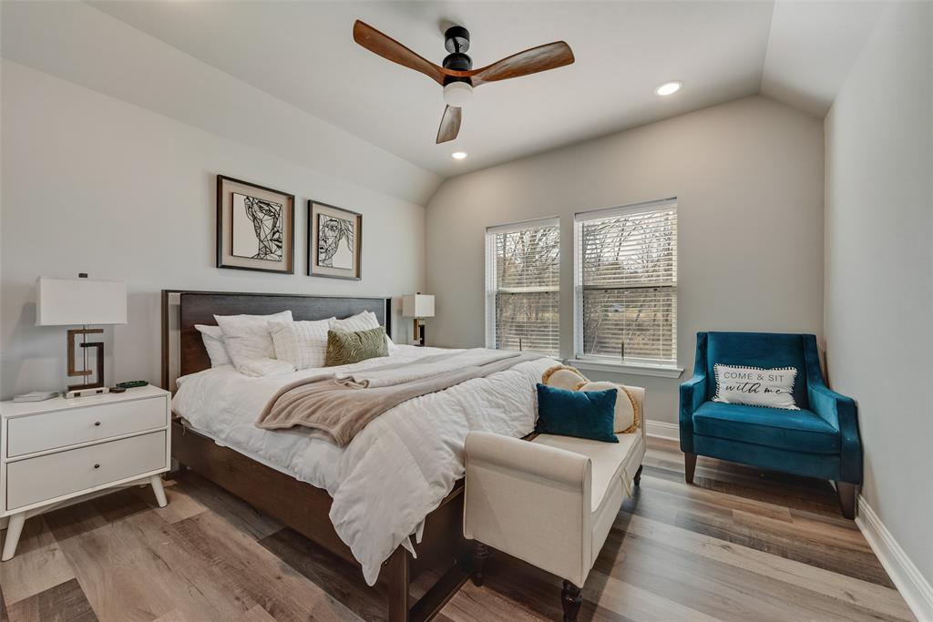 421 Ridgeview Road Sherman, TX 75092 - Photo 18 of 35 a bedroom with a bed a couch and a window