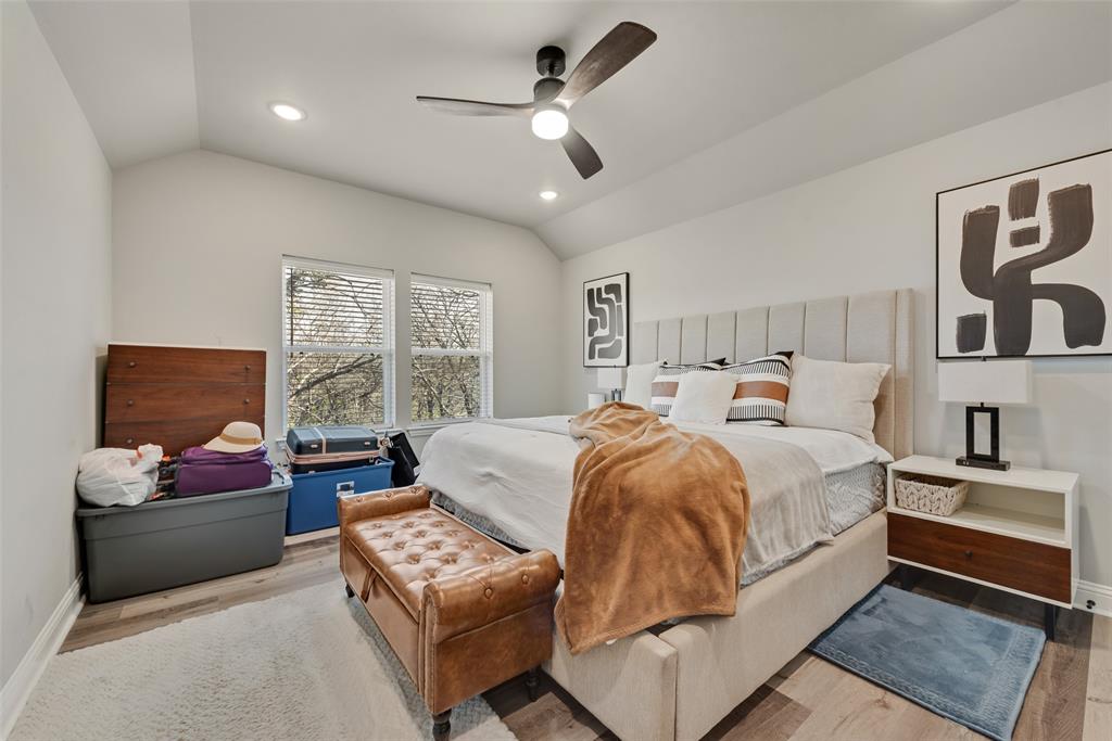 421 Ridgeview Road Sherman, TX 75092 - Photo 26 of 35 a bed room with bed and a couch