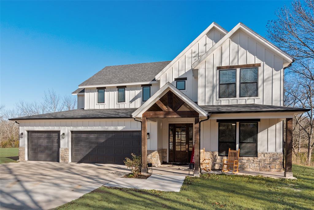 421 Ridgeview Road Sherman, TX 75092 - Photo 6 of 35 a front view of a house with a yard