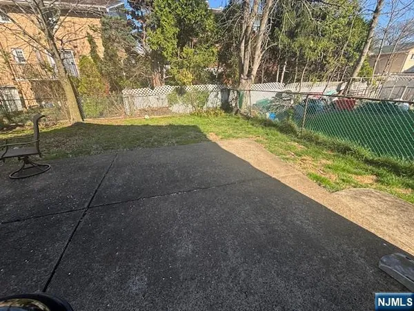 a view of backyard with green space