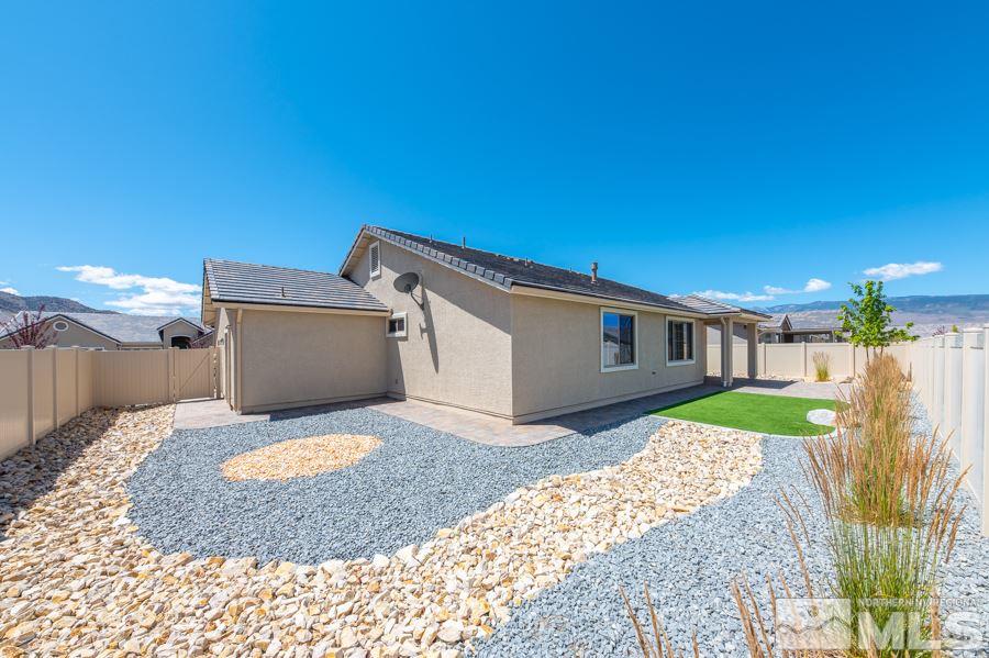 2417 Silver Maple Drive Reno, NV 89521 - Photo 28 of 38 a view of a house with a patio