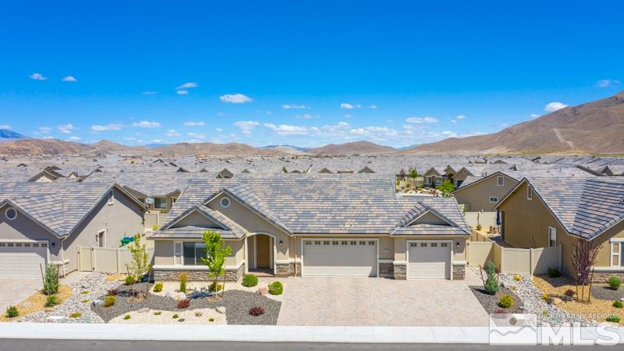 2417 Silver Maple Drive Reno, NV 89521 - Photo 3 of 38 front view of a house with a mountain