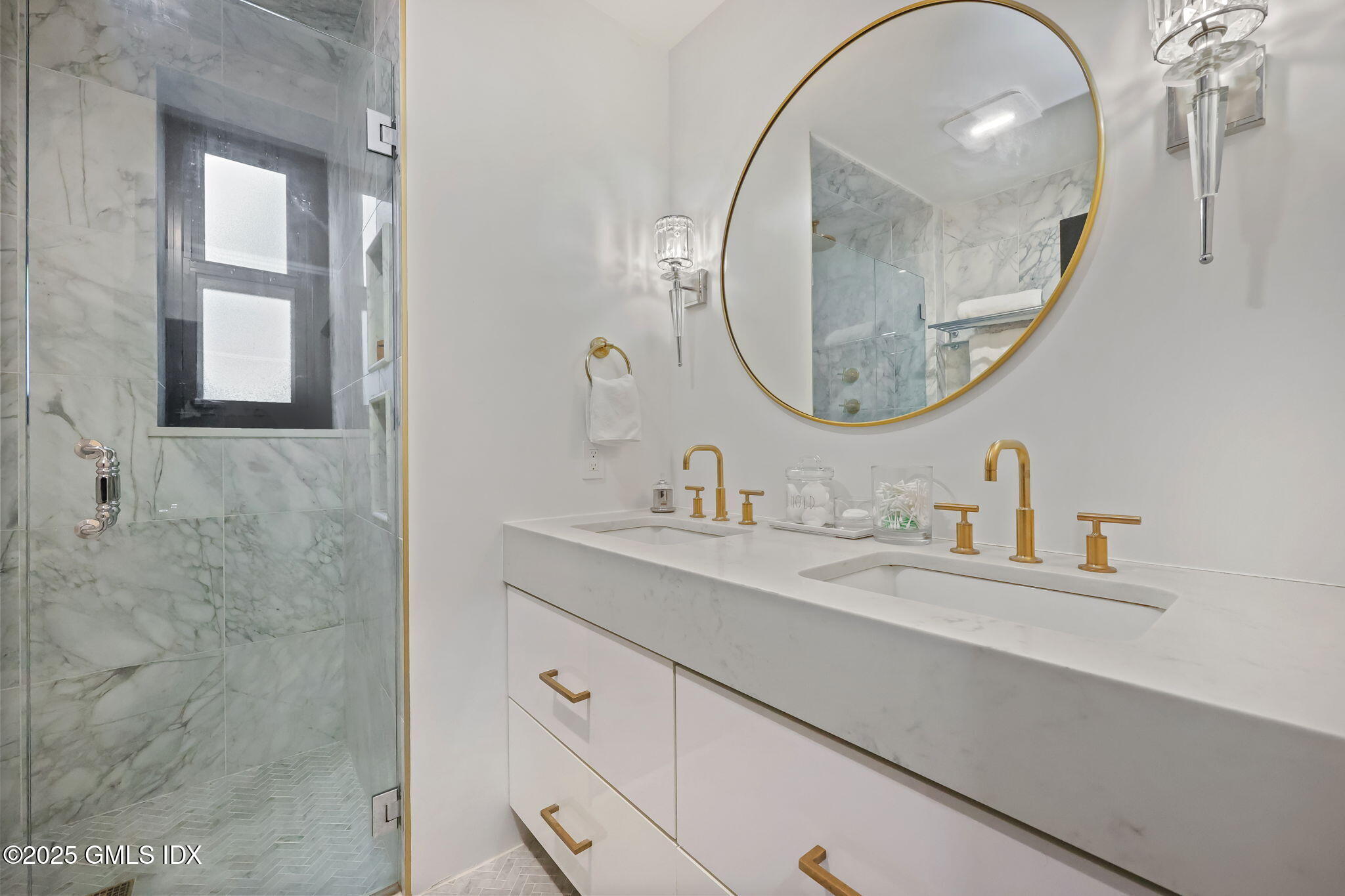 47 Lafayette Place, Unit 1H Greenwich, CT 06830 - Photo 16 of 23 a bathroom with a double vanity sink and a mirror