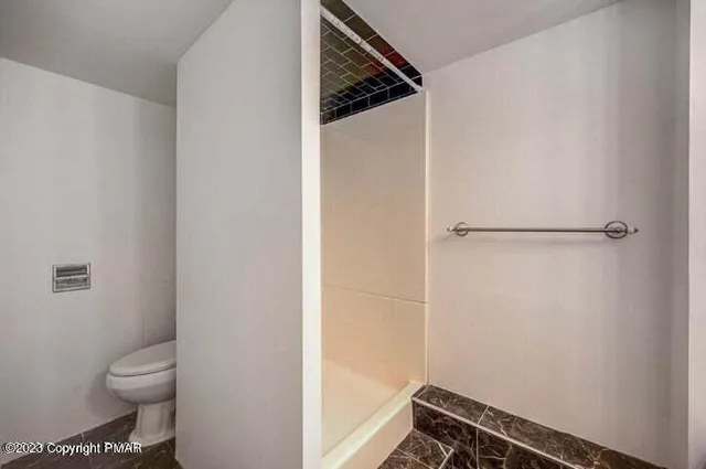 a bathroom with a sink vanity and a mirror