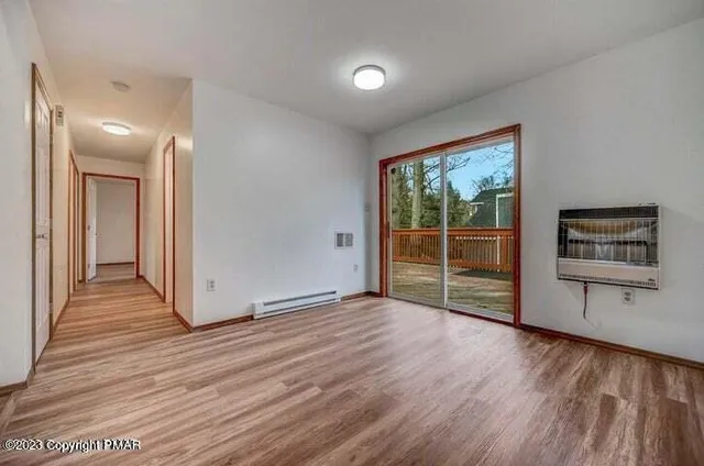 a kitchen with stainless steel appliances granite countertop a stove and a refrigerator