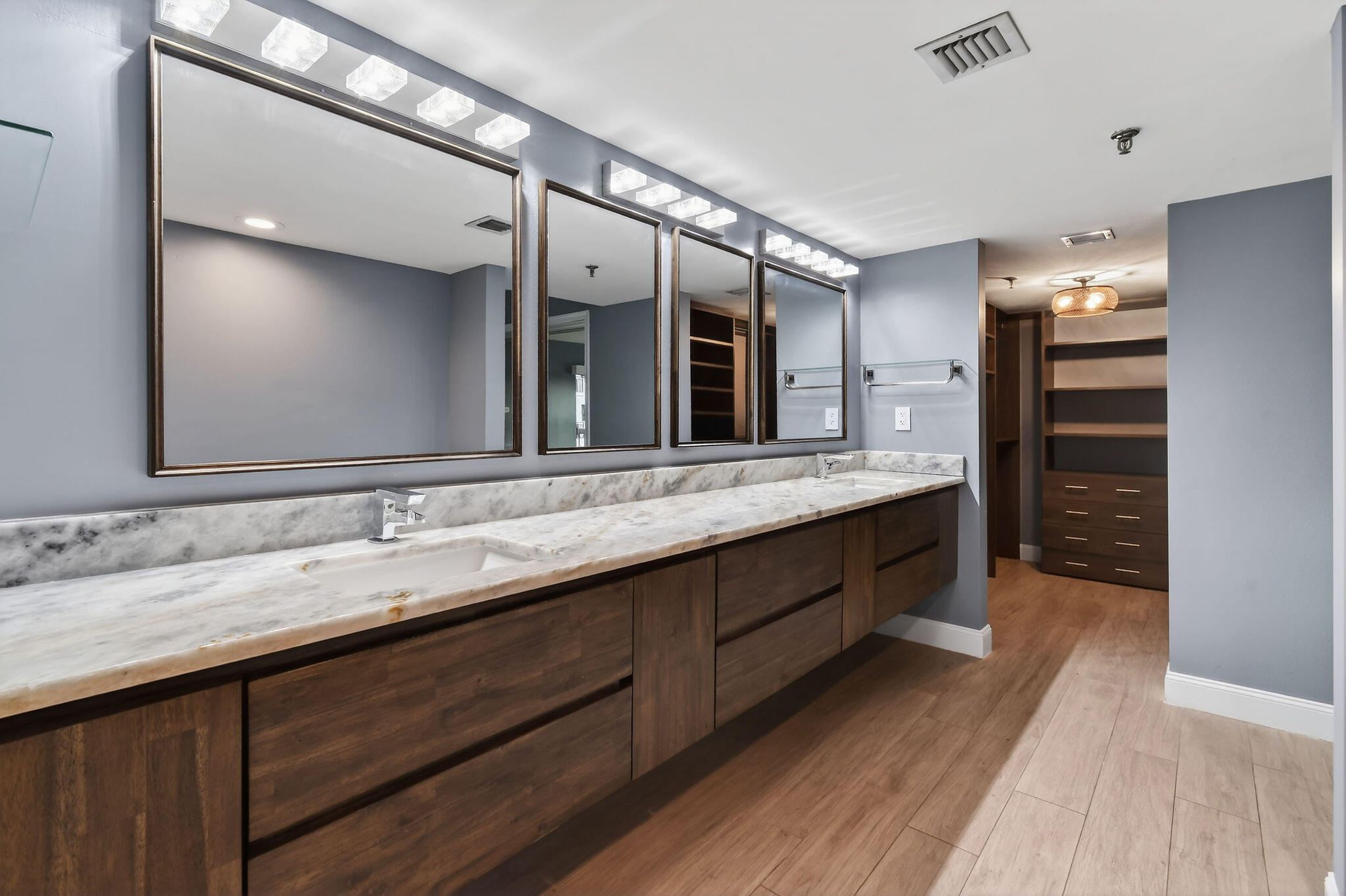 372 Golfview Road, Unit 201 North Palm Beach, FL 33408 - Photo 22 of 45 a bathroom with double vanity sinks and a large mirror