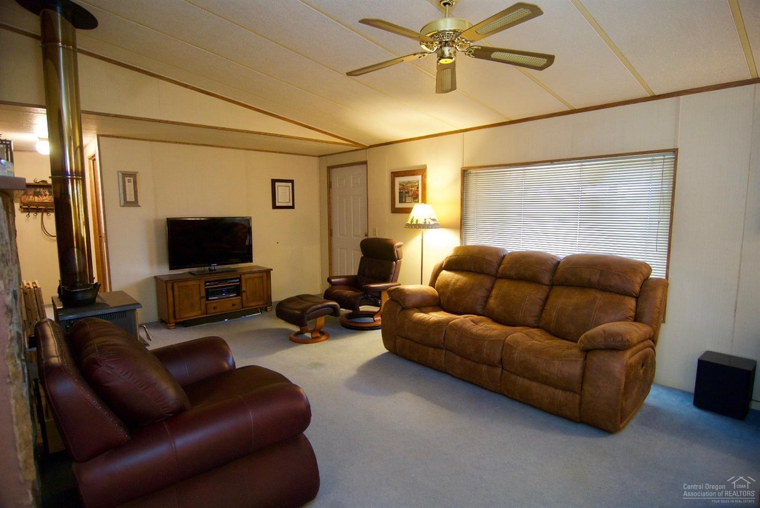 6006 Southwest Cougar Road Terrebonne, OR 97760 - Photo 4 of 20 living room from other corner, front doo