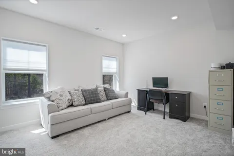 a bathroom with a toilet and a sink