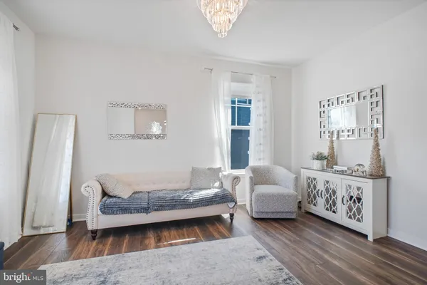 a living room with furniture and a couch