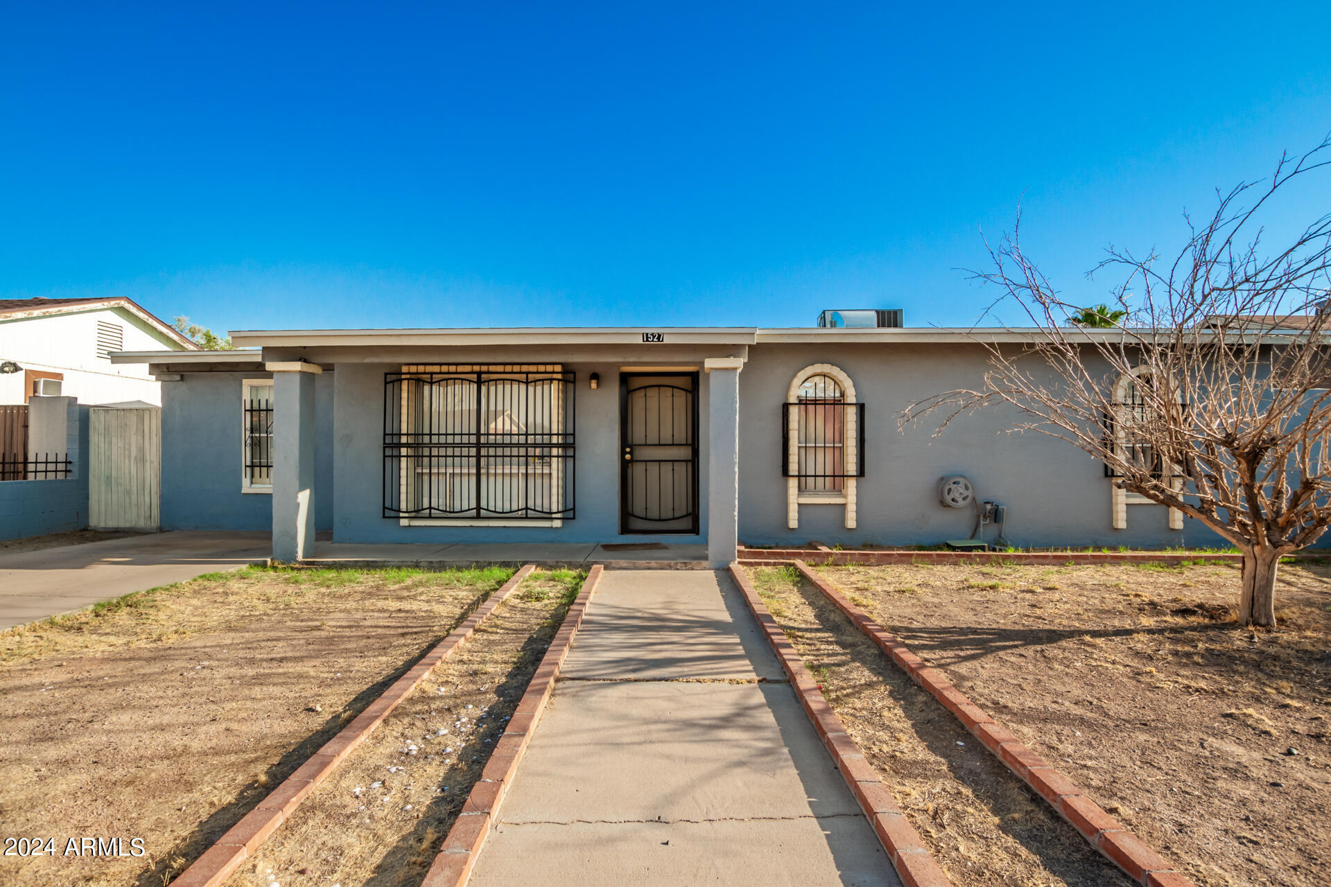 1527 West Carson Road Phoenix, AZ 85041 - Photo 1 of 22 Front View of the House