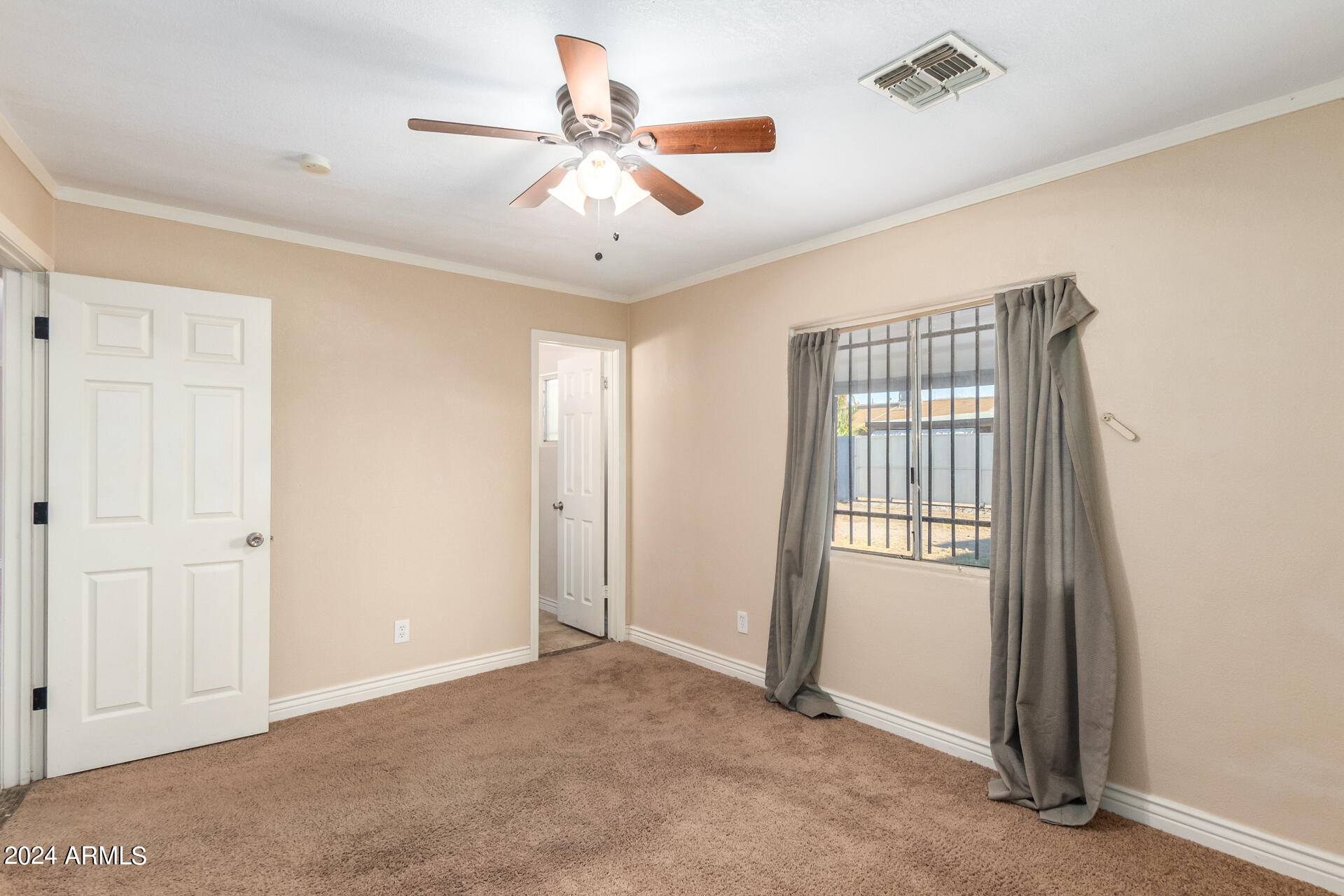 1527 West Carson Road Phoenix, AZ 85041 - Photo 7 of 22 Primary Bedroom