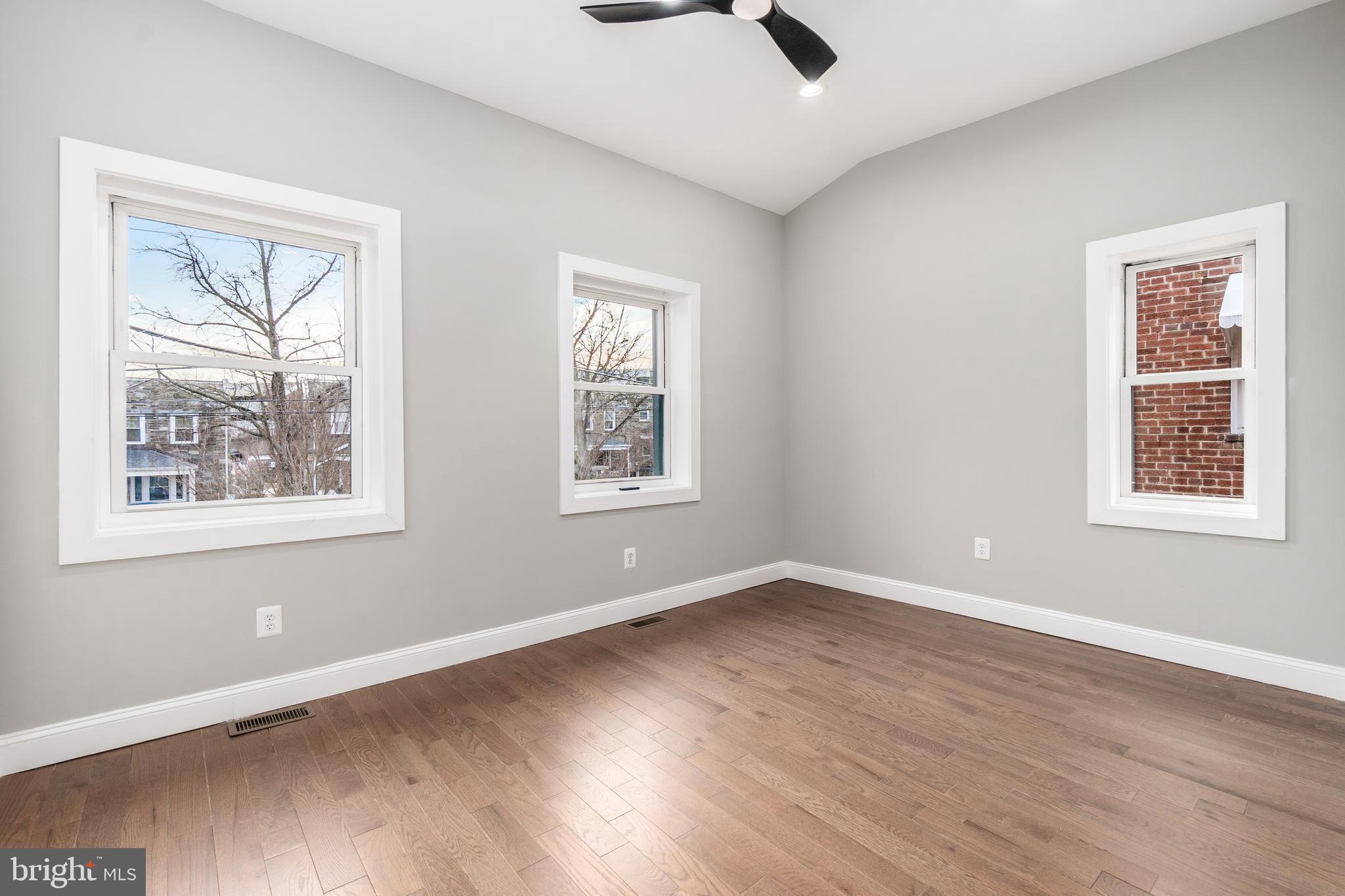 928 Perry Place Northeast Washington, DC 20017 - Photo 17 of 36 a view of an empty room with windows
