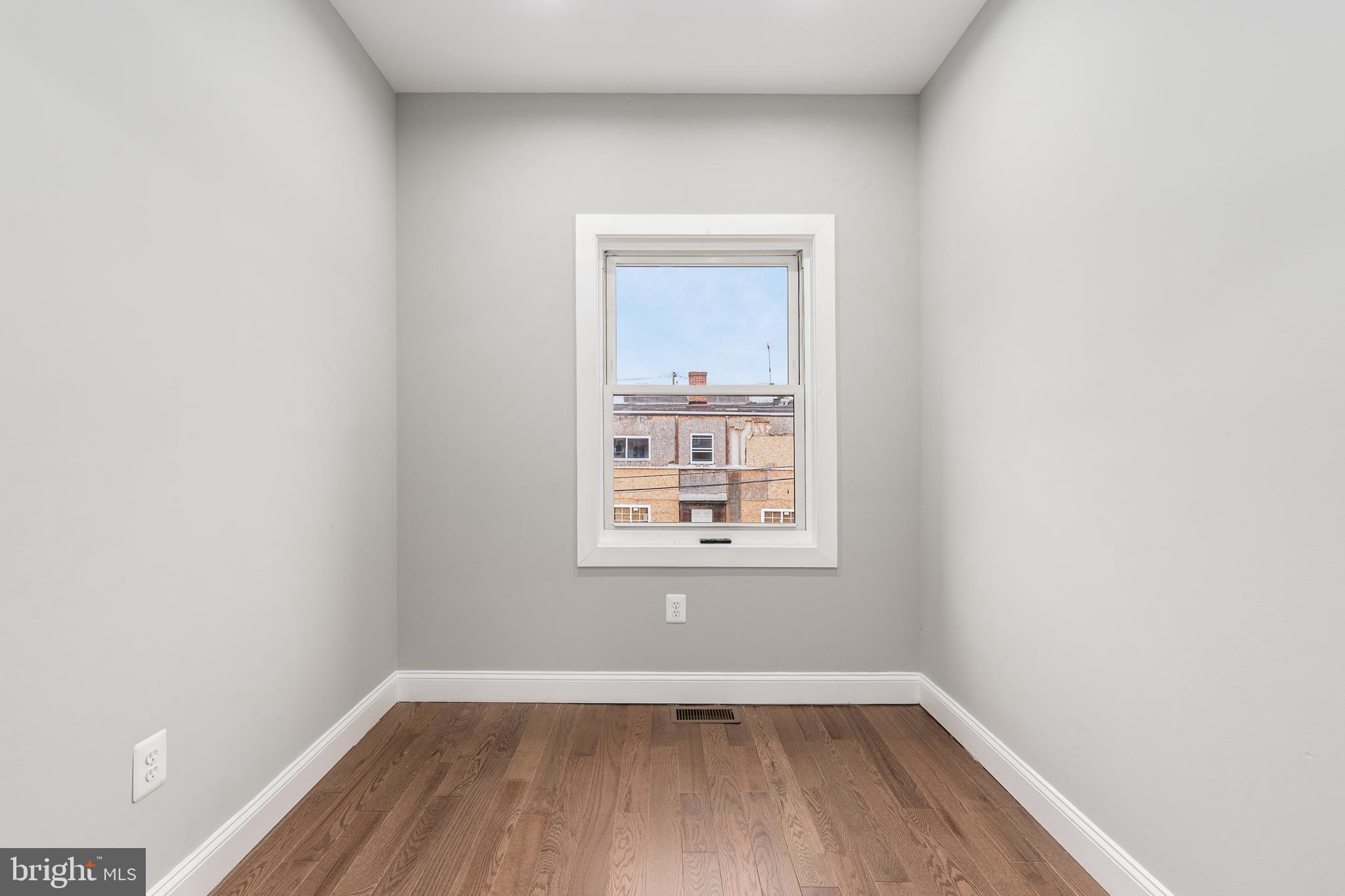 928 Perry Place Northeast Washington, DC 20017 - Photo 22 of 36 an empty room with a window