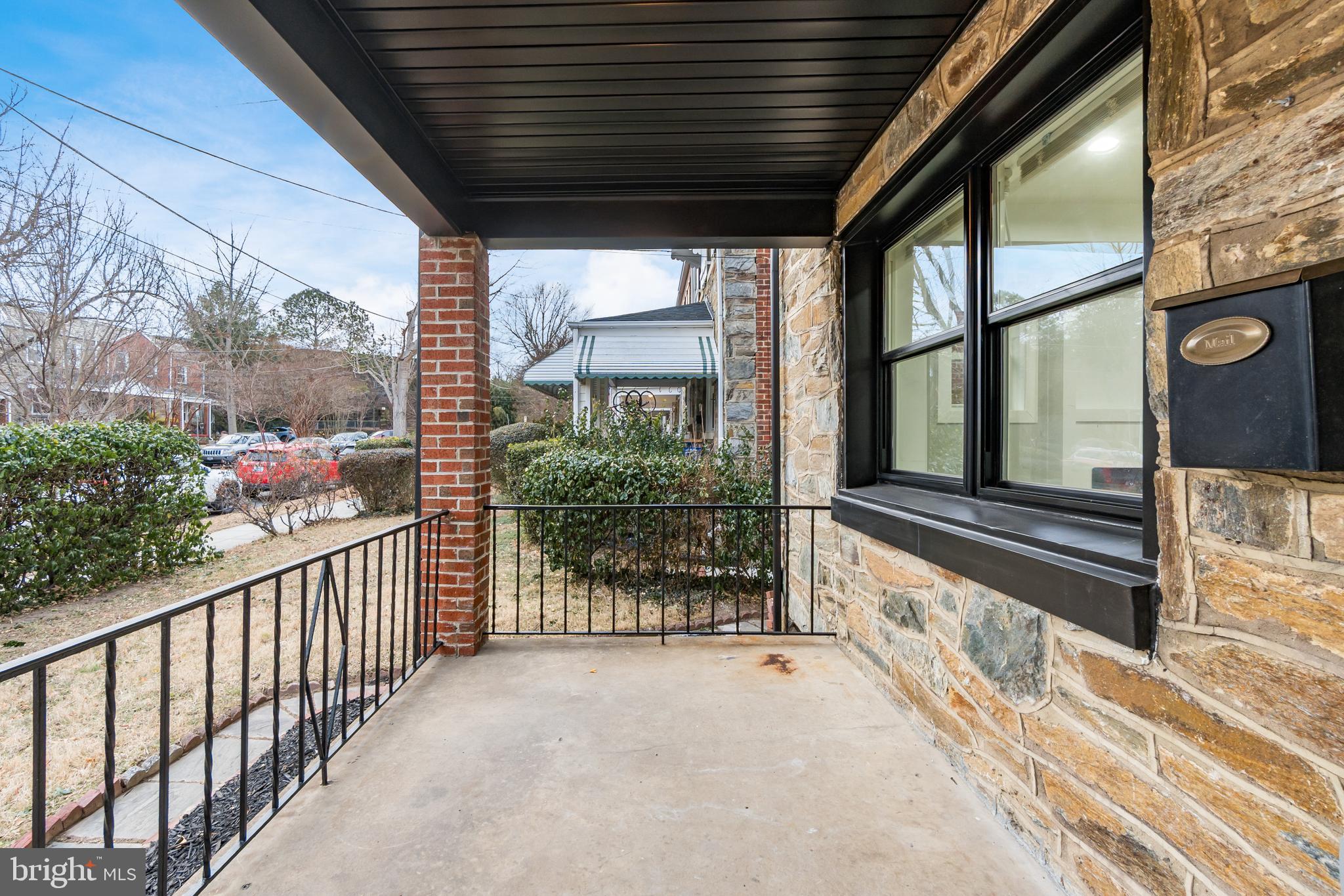928 Perry Place Northeast Washington, DC 20017 - Photo 3 of 36 a view of a porch