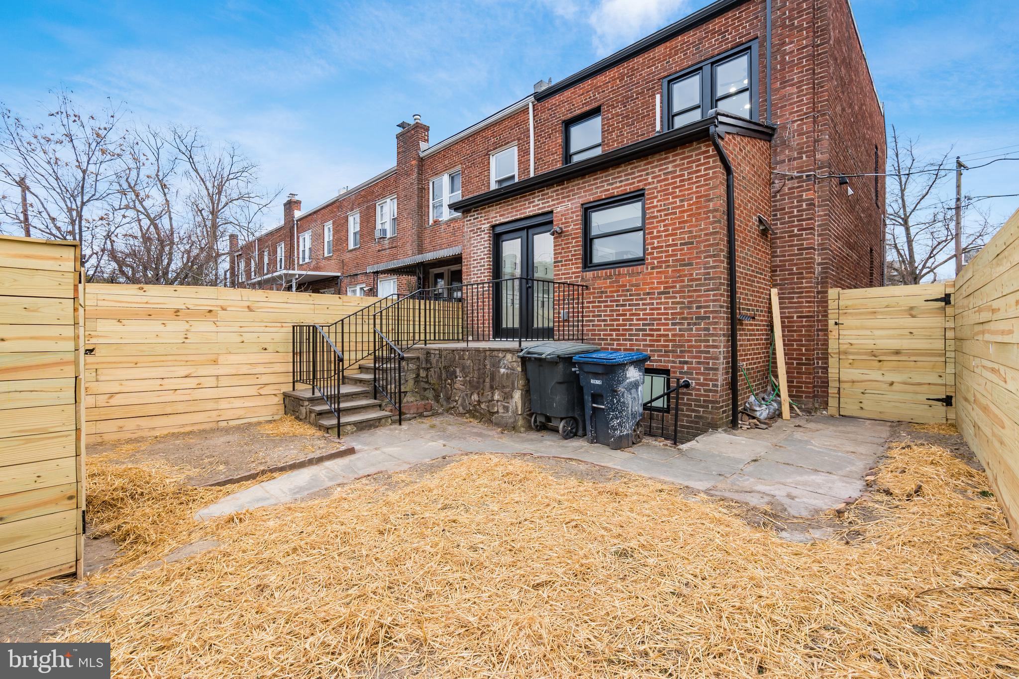 928 Perry Place Northeast Washington, DC 20017 - Photo 35 of 36 a view of a house with a patio