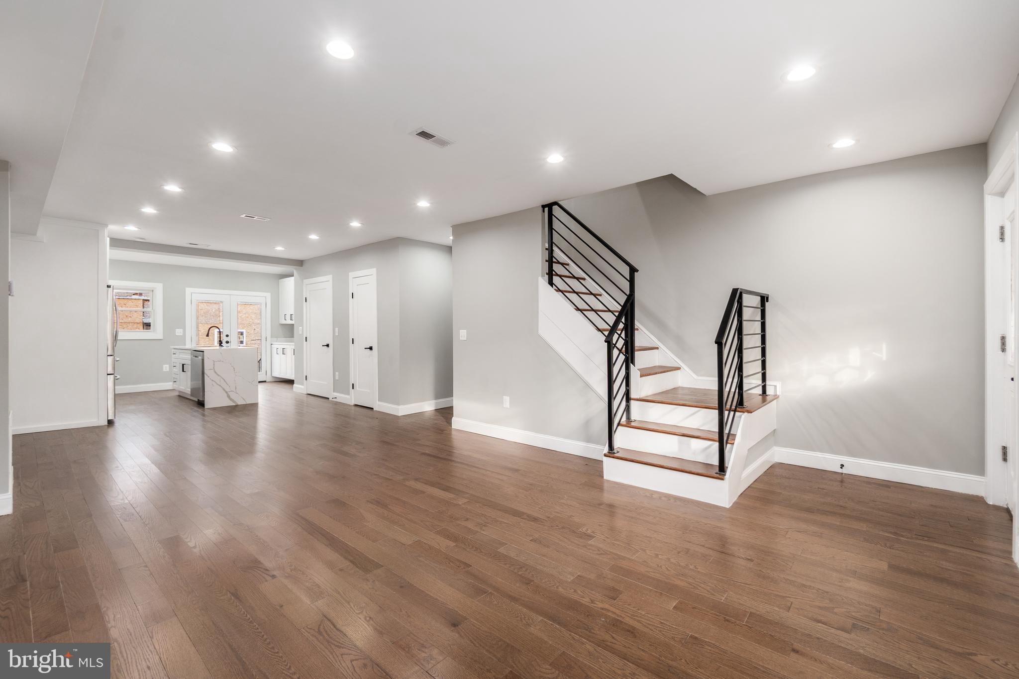 928 Perry Place Northeast Washington, DC 20017 - Photo 6 of 36 a view of livingroom with furniture and wooden floor