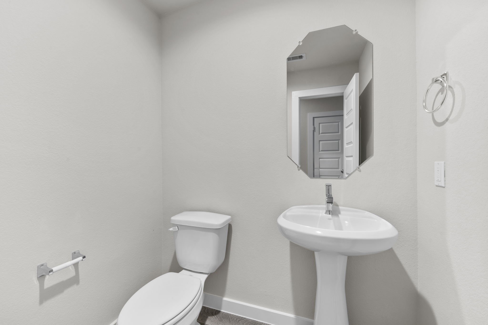 3015 Boulder Ridge Drive Rosenberg, TX 77471 - Photo 29 of 34 a bathroom with a toilet sink and mirror