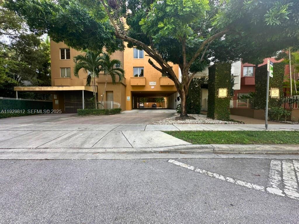 2630 Southwest 28th Street, Unit 44 Miami, FL 33133 - Photo 2 of 12 a view of a house with a street