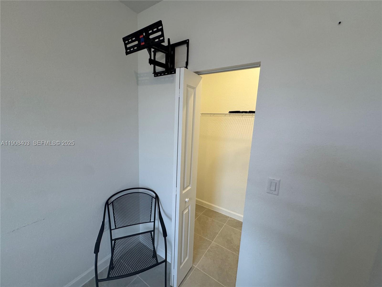 28850 Southwest 163rd Avenue, Unit 2 Homestead, FL 33033 - Photo 11 of 16 a picture of a bathroom with a sink and a mirror