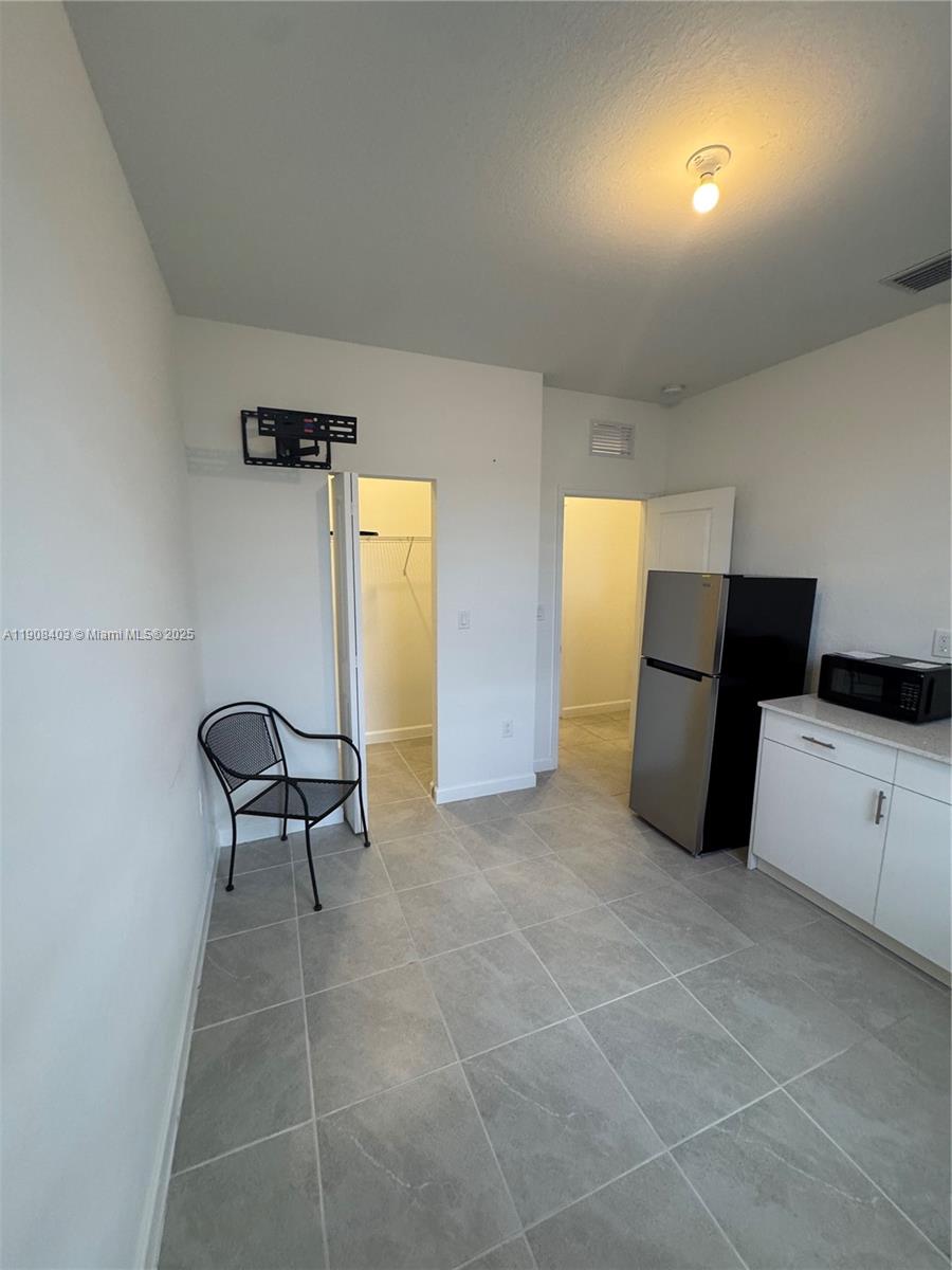 28850 Southwest 163rd Avenue, Unit 2 Homestead, FL 33033 - Photo 13 of 16 a view of cabinets